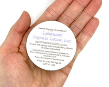 Load image into Gallery viewer, Lavender lotion bar in palm
