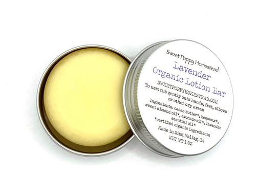 Zero waste lotion bar in tin with lid off